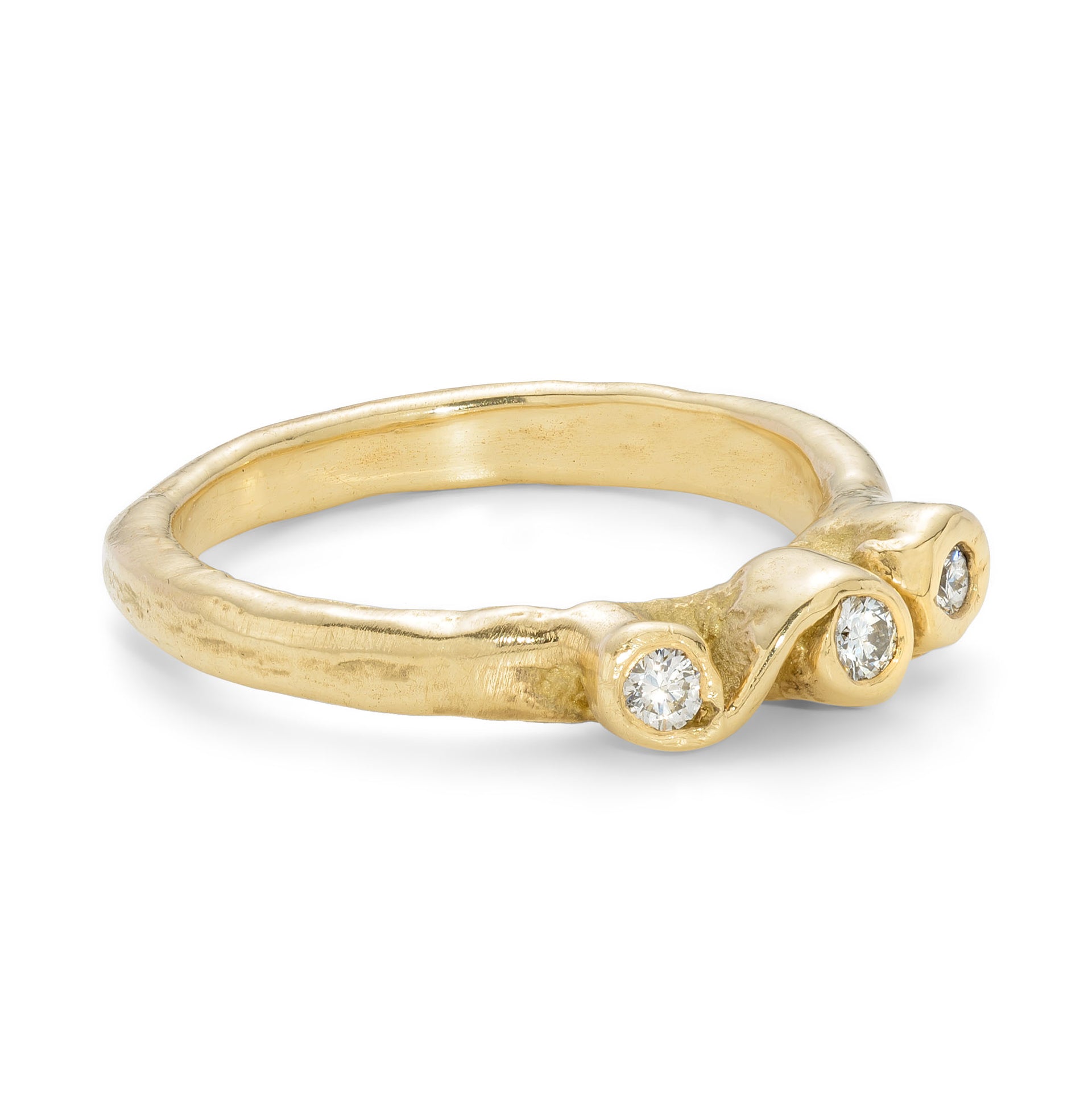Side view of an 18ct gold, 3 diamond Emily Nixon engagement ring.