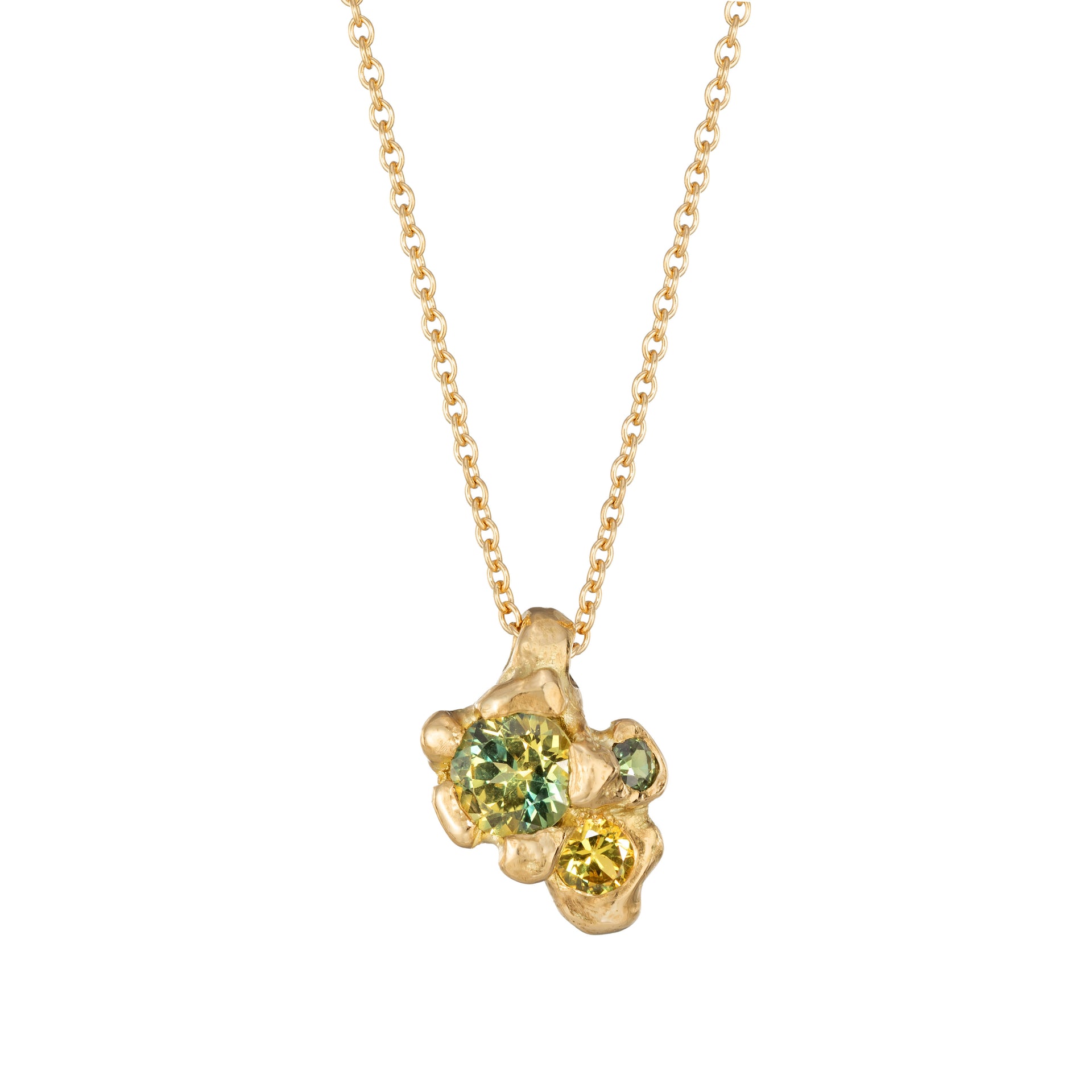 The Rift pendant featuring beautiful green sapphires embedded in 18ct gold. By Emily Nixon