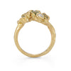 This Little Furbelow is set with stunning sea lettuce green sapphires in an 18ct yellow gold band. By Emily Nixon.
