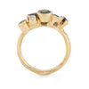 This unique Nori ring is set with ocean teal sapphires in a 18ct yellow gold band. By Emily Nixon