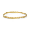 Cockle textured bangle in 9ct yellow gold
