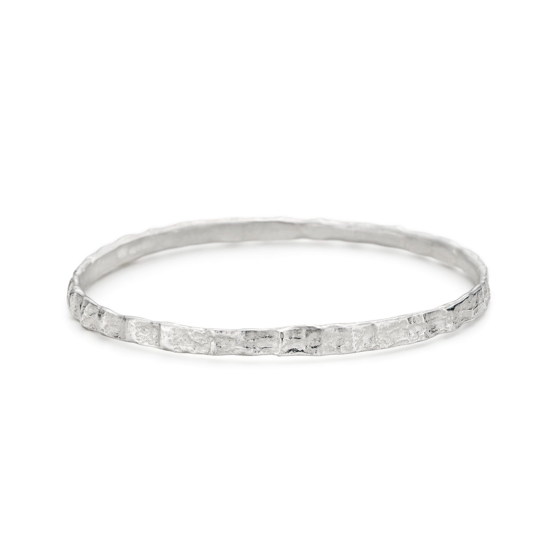 Emily's fine simple silver bangle with natural texture