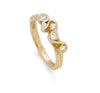 Upright, front profile of this organic 18ct gold and diamond engagement ring by Emily Nixon, a Cornish jeweller.