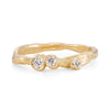 18ct gold Emily Nixon engagement ring, set with 3 diamonds in an unusual, craggy design.