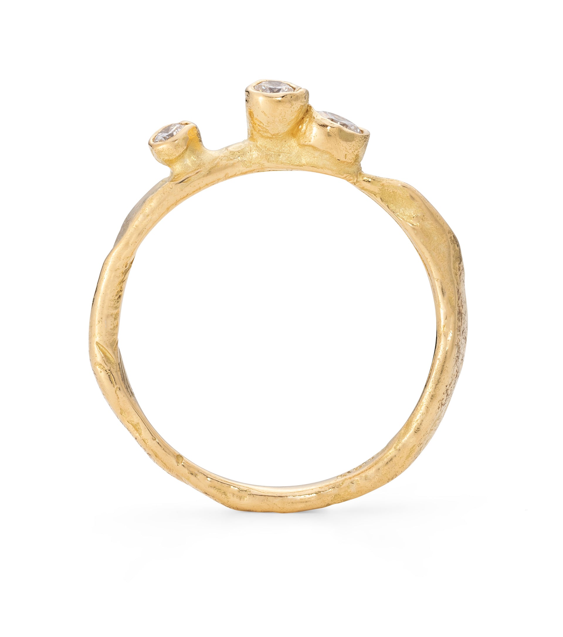 Side profile of an 18ct gold and diamond engagement ring, handcrafted by Emily Nixon in Cornwall.