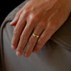 18ct gold and diamond engagement ring by Cornish jeweller Emily Nixon. Photographed on a models hand.