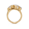 Side profile of an organic textured 18ct gold and diamond ring, handmade by Emily Nixon.