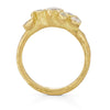 A side profile of an ethically sourced 18ct gold and diamond engagement ring by Emily Nixon.