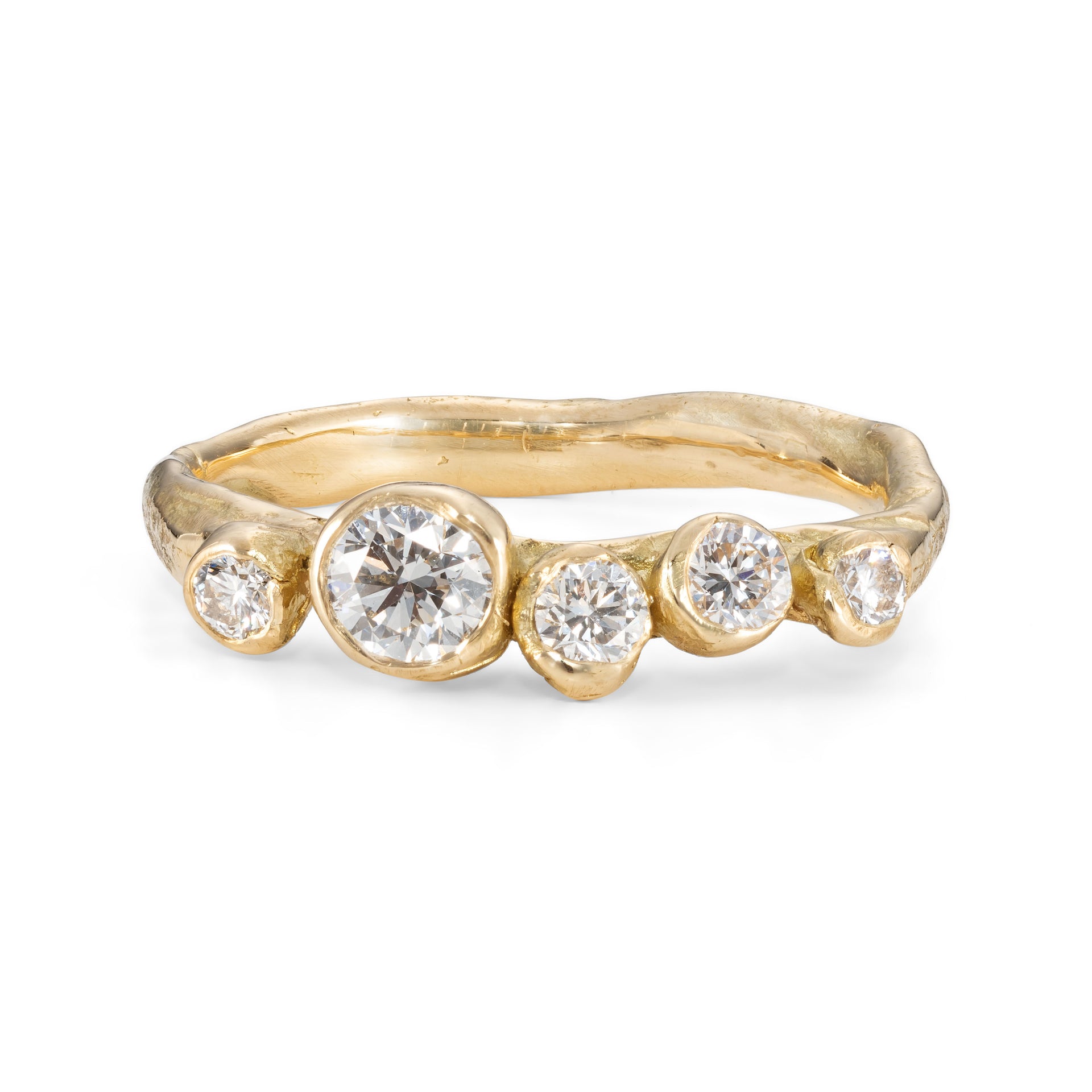 Alternative 18ct gold engagement ring, set with 5 ethically sourced diamonds. This ring has been designed and created by Emily Nixon in Cornwall.