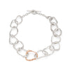 This unique, sculptural, large chain jewellery design is inspired and handmade on the coast of Cornwall. Irregular chunky links follow the form of pebbles. Unconventional with an artistic style, this unusual silver and rose gold necklace is intrinsically coastal and an Emily Nixon classic design. Made in Cornwall.