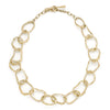 Unconventional gold chain necklace by Cornwall jewellery designer Emily Nixon. Each link has been handmade to vary in size. The solid 9ct gold retains a rich lustre without being overly shiny. The necklace can be worn at different lengths: neck choker or longer. Emily’s signature sea worn finish gives the impression of sea tumbled treasure, jewellery handmade in Cornwall, made tactile by the tide. 