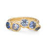 A statement ring of cornflower blue sapphires set in 18ct yellow gold.