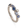 18ct white gold ring set with ocean blue sapphires from Sri Lanka