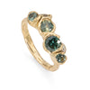 18ct yellow gold ring set with ethical sapphires.