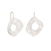 Large statement solid silver drop earrings. Unusual handmade design with stone-like textured surface with a hole through the centre. Handmade by Cornwall designer Emily Nixon.