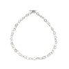 Fine links formed around the contours of little sea-worn pebbles ;A beautifully tactile necklace with a refined, organic character. By Emily Nixon