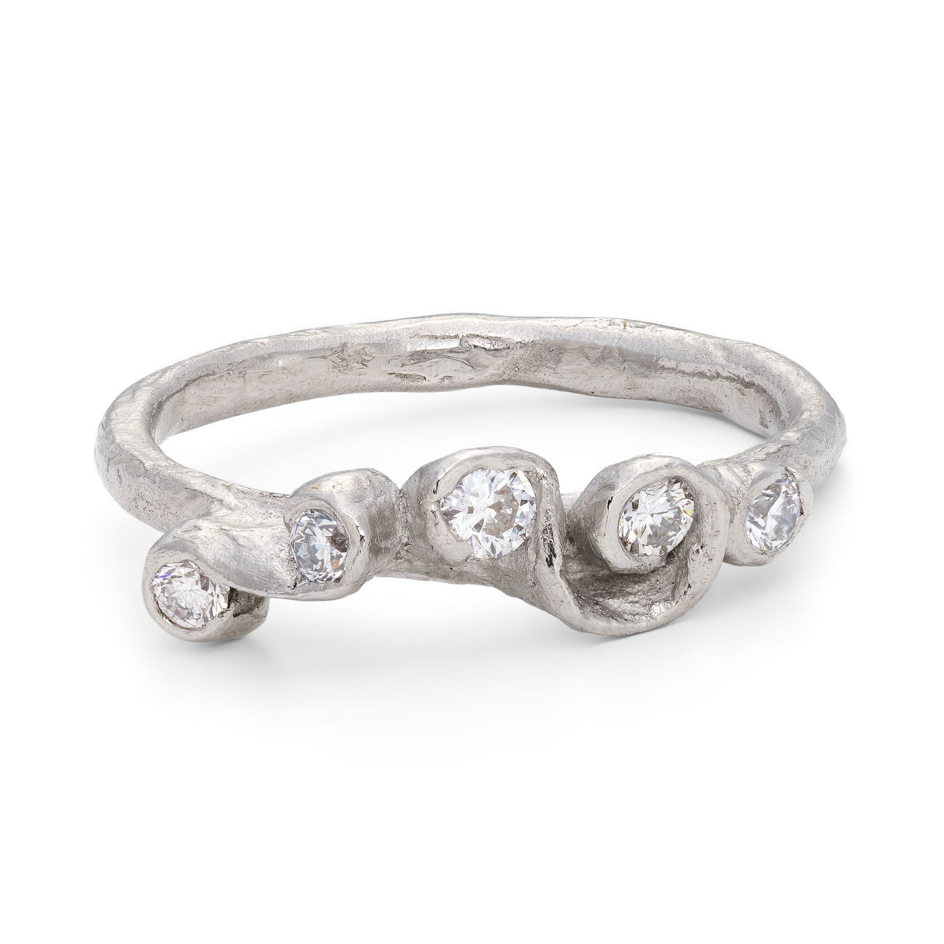 A platinum diamond engagement ring, handcrafted by Emily Nixon in Cornwall.