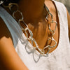 Large irregular sterling silver links, moulded by hand to create a sculptural, coastal necklace. 
The classic, signature design in this Cornwall jewellery designers organic jewellery range. Chunky links follow the form of beach pebbles, interconnected to create this large link silver chain necklace. A classic organic, coastal design in the natural, unconventional style of Emily’s jewellery.By Emily Nixon.
